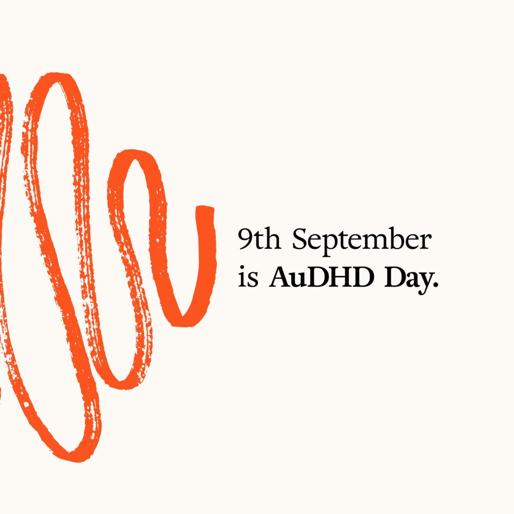 the image shows the text '9th September is AuDHD Day.' in black letters, while 'AuDHD Day' is set in bold on the centre right side on a cream coloured background. on the left hand side is the extention of the meandering orange scetch line from the former image, going small again.